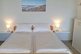 Schlafbereich mit Doppelbett