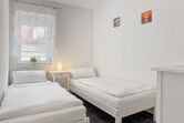 Schlafzimmer mit Einzelbetten