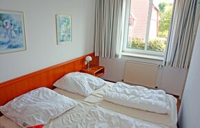 Schlafzimmer mit Doppelbett