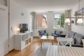 Wohnbereich mit TV und WLAN-Hotspot