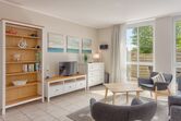 Wohnbereich mit TV und WLAN-Hotspot